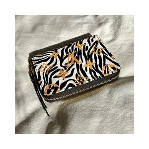 Louis Vuitton Zippy Coin Purse Jungle Monogram in Ivory Multicolor